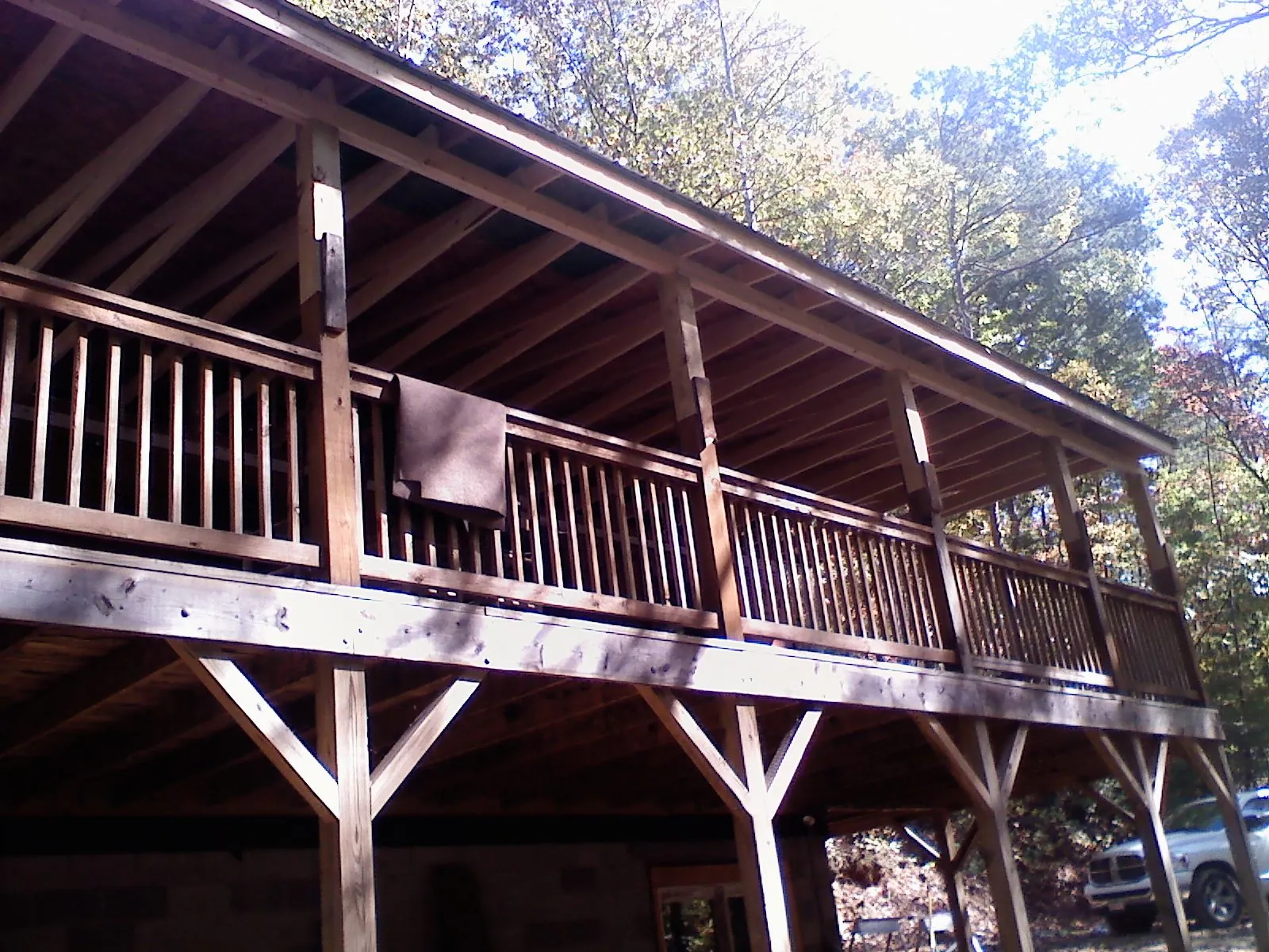 Timber framing under a new elevated porch and deck in Perrysburg